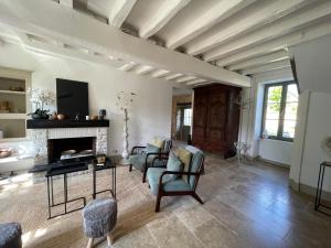 Χώρος καθιστικού στο Maison Marguerite, Maison de Charme,jacuzzi