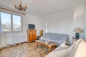 Postel nebo postele na pokoji v ubytování Le Repaire des Travailleurs - Balcon Privé - Jonage + 6 fotografií