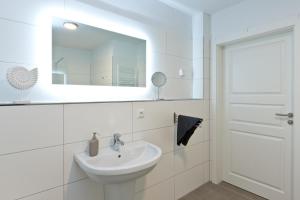 Un baño de Apartment unter den Kiefern 109 16 fotos más