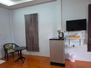 Μια τηλεόραση ή/και κέντρο ψυχαγωγίας στο Cocoloco bungalow