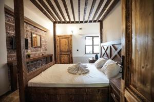 Giường trong phòng chung tại Gülbaba Hotels