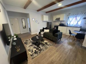 a living room with a couch and a table at The Vantage in Lusaka