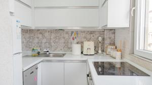 Η κουζίνα ή μικρή κουζίνα στο VD Apartment +24 φωτογραφίες