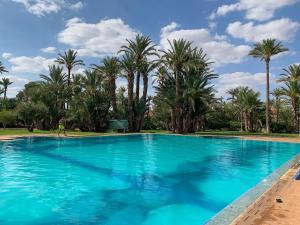 Φωτογραφία από το άλμπουμ του Traditional, Cozy and Quiet Apartment, Pool, Palmeraie στο Μαρακές