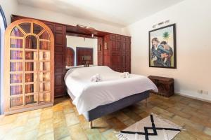 Ένα ή περισσότερα κρεβάτια σε δωμάτιο στο Traditional, Cozy and Quiet Apartment, Pool, Palmeraie +36 φωτογραφίες