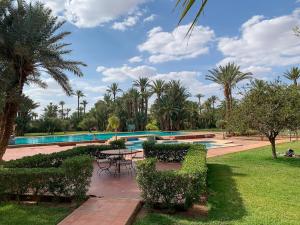 Πισίνα στο ή κοντά στο Traditional, Cozy and Quiet Apartment, Pool, Palmeraie