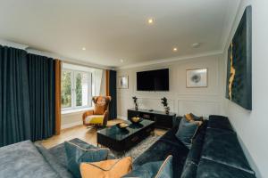 Μια τηλεόραση ή/και κέντρο ψυχαγωγίας στο Eagleside Apartments