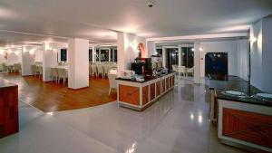 Εστιατόριο ή άλλο μέρος για φαγητό στο Jasmine Court Hotel Central Beachfront Location !