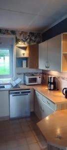 Η κουζίνα ή μικρή κουζίνα στο Jolie maison vue sur mer