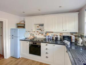 Køkken eller tekøkken på Bluebell House + 28 billeder