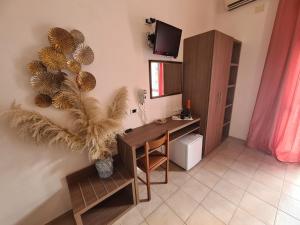 Μια τηλεόραση ή/και κέντρο ψυχαγωγίας στο Hotel Gladys +6 φωτογραφίες