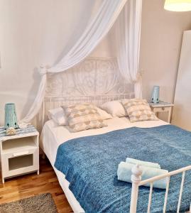 Ένα ή περισσότερα κρεβάτια σε δωμάτιο στο Apartment Katarina