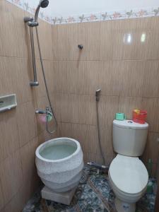 Koupelna v ubytování Omah moja gabugan