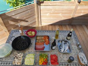 a tray of food on a table with some food at Chambre Insolite L'écureuil in Coligny