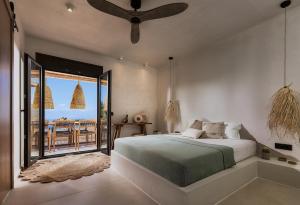 Ένα ή περισσότερα κρεβάτια σε δωμάτιο στο Villa Kosmima