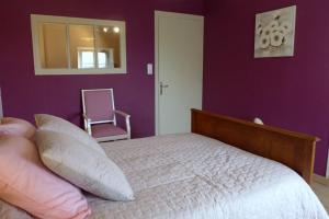 Postel nebo postele na pokoji v ubytování Maison rosalice