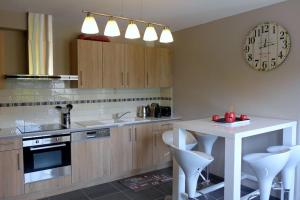 Køkken eller tekøkken på Gite de la suize