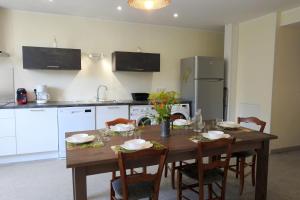 Kuchyň nebo kuchyňský kout v ubytování Graine