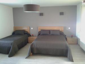 Ένα ή περισσότερα κρεβάτια σε δωμάτιο στο Gite la Chartrouille