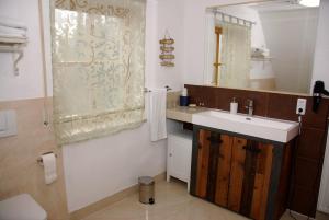 Ένα μπάνιο στο Business Apartment Renate