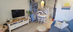 Μια τηλεόραση ή/και κέντρο ψυχαγωγίας στο Loft Cala Canyelles