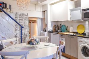 Η κουζίνα ή μικρή κουζίνα στο Loft Cala Canyelles