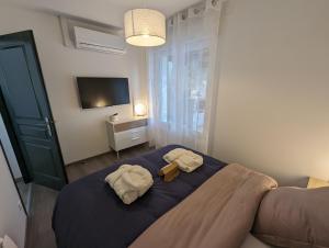 Postel nebo postele na pokoji v ubytování Chez anita + 33 fotografií