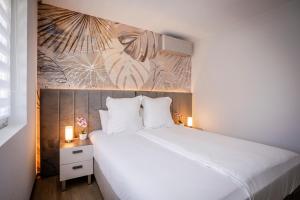 Ένα ή περισσότερα κρεβάτια σε δωμάτιο στο Évasion, Proche Basel, F2 Moderne & Terrasse