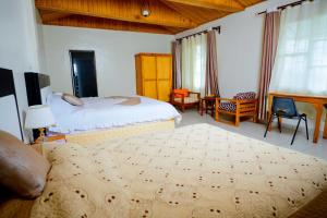 Postel nebo postele na pokoji v ubytování Quality Inn Motel Nyanza