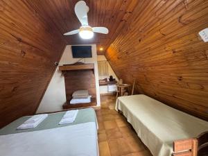 TV a/nebo společenská místnost v ubytování Chalés Verde Vida