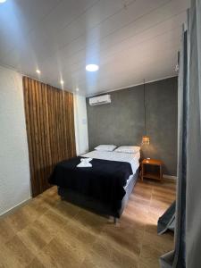 Ένα ή περισσότερα κρεβάτια σε δωμάτιο στο Casa de temporada com 6 quartos na Praia da Lagoa do Pau Coruripe - AL