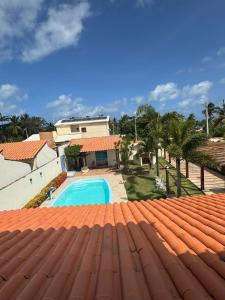 Πισίνα στο ή κοντά στο Casa de temporada com 6 quartos na Praia da Lagoa do Pau Coruripe - AL