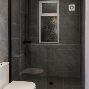 Et badeværelse på 3BR Sleeps 6 Free Parking Near Glasgow City Centre