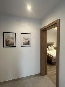 Ένα ή περισσότερα κρεβάτια σε δωμάτιο στο The HIDDEN Apartment