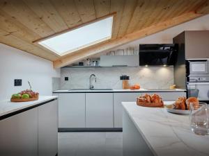 Η κουζίνα ή μικρή κουζίνα στο Coco Chatel - OVO Network