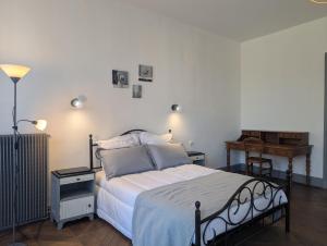 En eller flere senge i et værelse på La maison d'alice