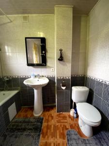 Koupelna v ubytování Центр 21 Чимкент Двушка