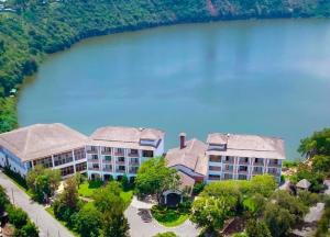 an aerial view of a resort with a body of water at Noora Resort 