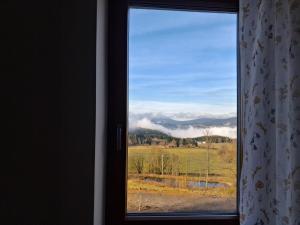 Nespecifikovaný výhled na hory nebo výhled na hory při pohledu z apartmánu