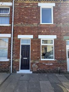 Bygningen som feriehuset ligger i