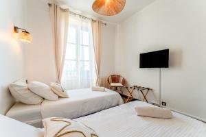 En eller flere senge i et værelse på Beau T3 Vue Vallée De L'eure