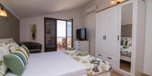 Llit o llits en una habitació de Nereo