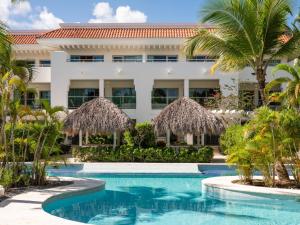 a view of the resort from the pool at Zel Punta Cana - All Suites in Punta Cana