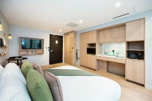 Η κουζίνα ή μικρή κουζίνα στο Wilde Aparthotels Lisbon Liberdade