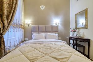 Ένα ή περισσότερα κρεβάτια σε δωμάτιο στο Theodoros Kolokotronis