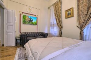 Ένα ή περισσότερα κρεβάτια σε δωμάτιο στο Theodoros Kolokotronis