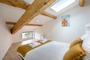 Ένα ή περισσότερα κρεβάτια σε δωμάτιο στο Confort & espace avec climatisation - T4 central