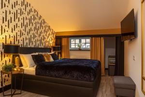 Postel nebo postele na pokoji v ubytování Golden Prague Rooms