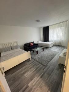 Postel nebo postele na pokoji v ubytování Apartment Centrum