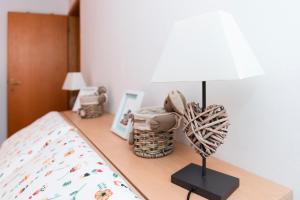 Giường trong phòng chung tại Cjase al Tistignar